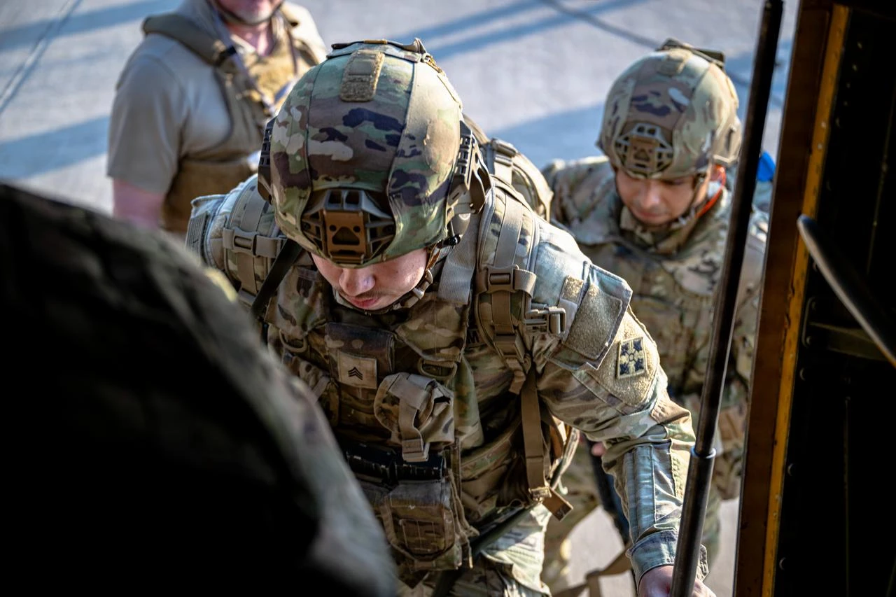 U.S. Army soldiers board a U.S. Air Force C-130J Super Hercules aircraft in the U.S. Central Command area of responsibility July 5, 2026. (Photo via U.S. Air Force)