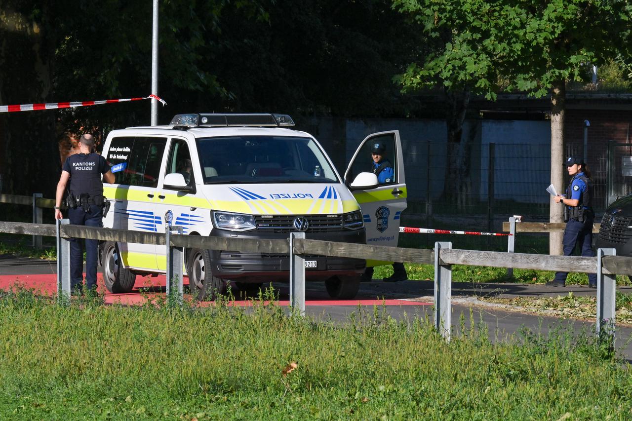 Police officers secure the area where a shooting occurred, in Aarau, northern Switzerland, on 30 August 2026. (AFP Photo)