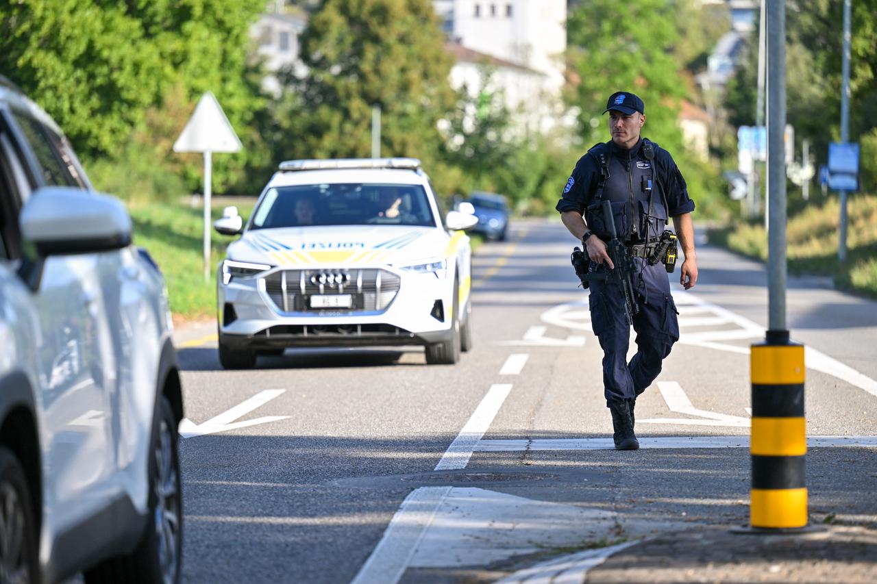 Police officers secure the area where a shooting occurred, in Aarau, northern Switzerland, on 30 August 2026. (AFP Photo)