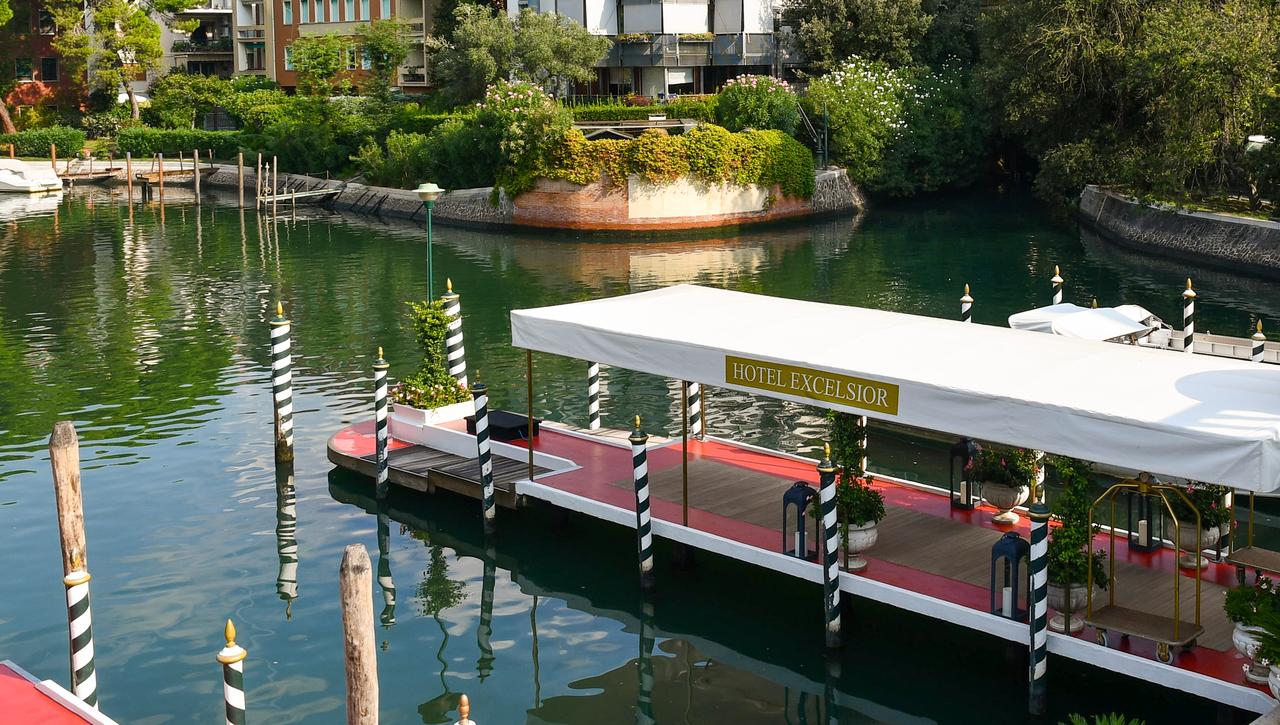 A private landing dock for Hotel Excelsior is seen along the waterfront on Venice Lido, Italy. (Adobe Stock Photo)