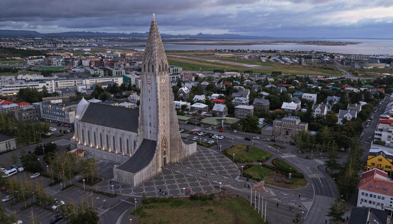 This aerial view taken on August 28, 2026, shows a panoramic view of Reykjavik, Iceland, with Hallgrimskirkja, Iceland's largest church, rising above the capital city's skyline. (AFP Photo)