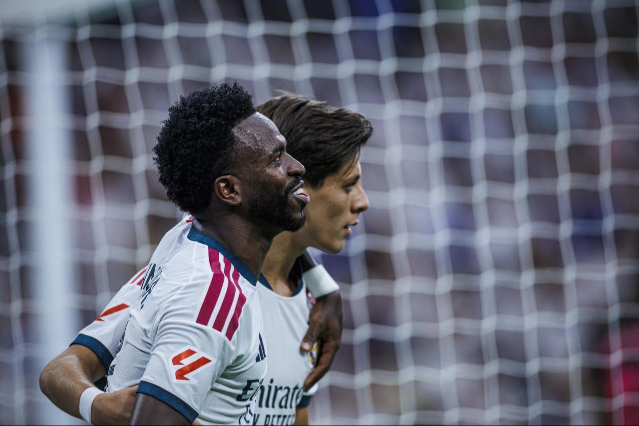 Arda Guler of Real Madrid CF celebrates his goal with Vinicius Junior of Real Madrid CF (L) during the LaLiga EA Sports match between Real Madrid CF and Malaga CF at Bernabeu Stadium on August 30, 2026, in Madrid, Spain. (AA Photo)