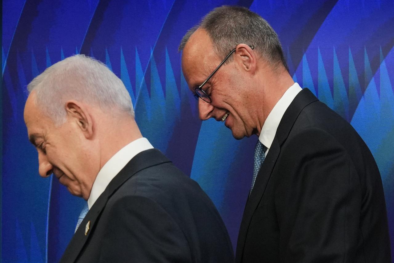 Israeli Prime Minister Benjamin Netanyahu (L) and German Chancellor Friedrich Merz depart after a joint press conference in Jerusalem on December 7, 2025. (AFP Photo)