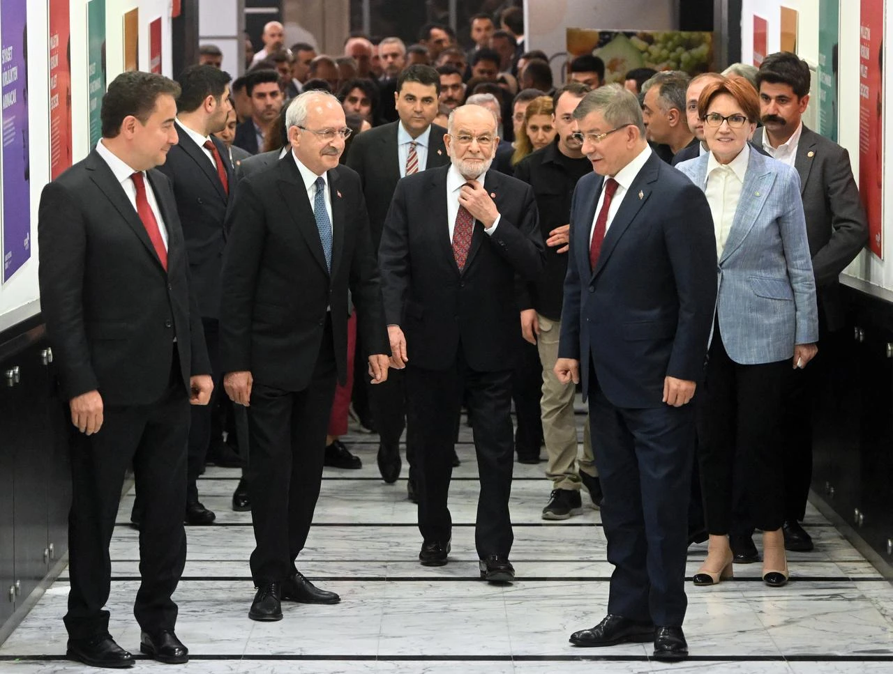 CHP's Kemal Kilicdaroglu (2nd L), then-Leader of Good Party Meral Aksener (2nd R), Felicity Party's then-Chairman Temel Karamollaoglu (3rd L), DEVA Party leader, Ali Babacan (L), Future Party Chairman Ahmet Davutoglu (3rd R) arrive to hold a press conference at CHP Headquarters after voting ended for 28th presidential and parliamentary elections in Ankara, Türkiye on May 15, 2023. (AA Photo)