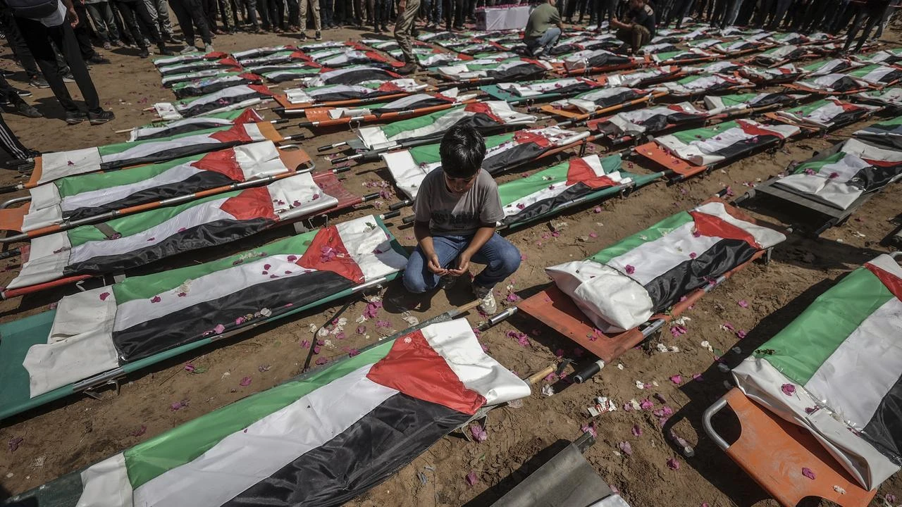 Gaza holds mass funeral for 112 people recovered from rubble