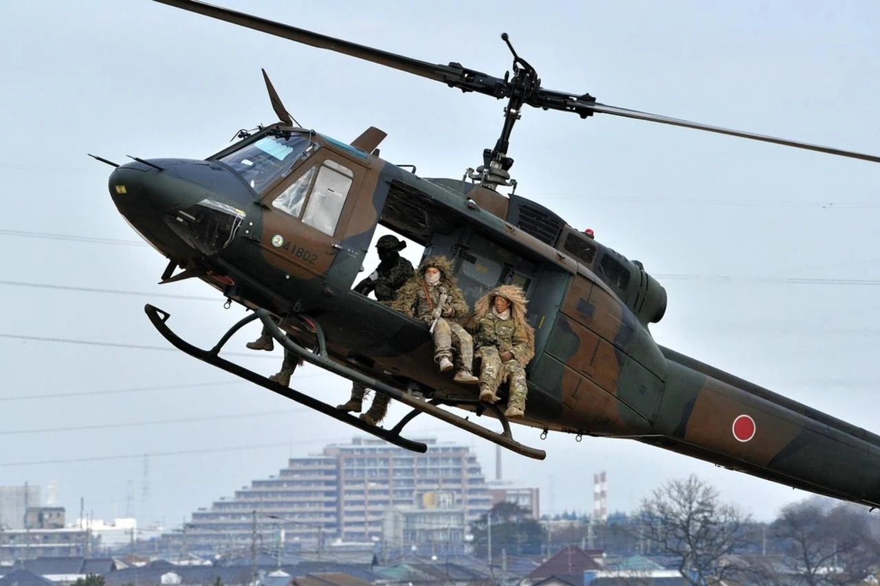 Japan pitches military buildup as engine for economic growth
