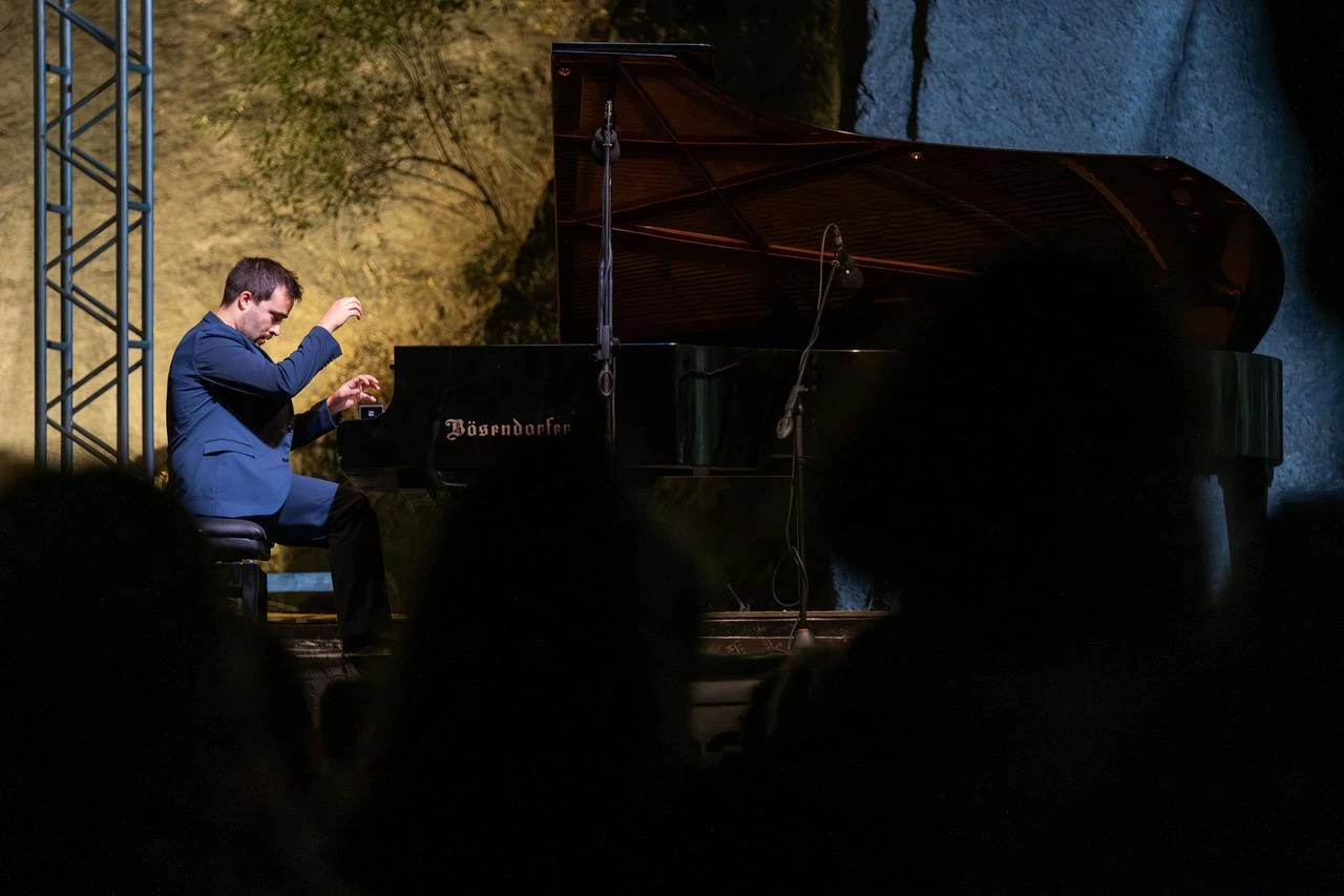 Portuguese pianist Vasco Dantas performs a program featuring Fado melodies, Portuguese dances and classical works during the 23rd International Gumusluk Music Festival in Bodrum, Türkiye, Aug. 4, 2026. (AA Photo)