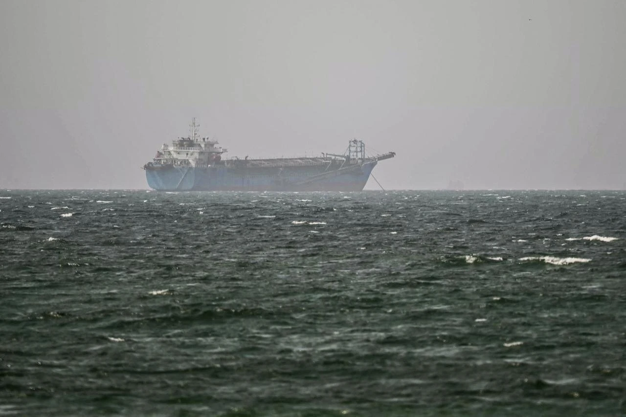 A vessel is anchored off the coast of Sharjah in the United Arab Emirates on August 3, 2026. (AFP Photo)