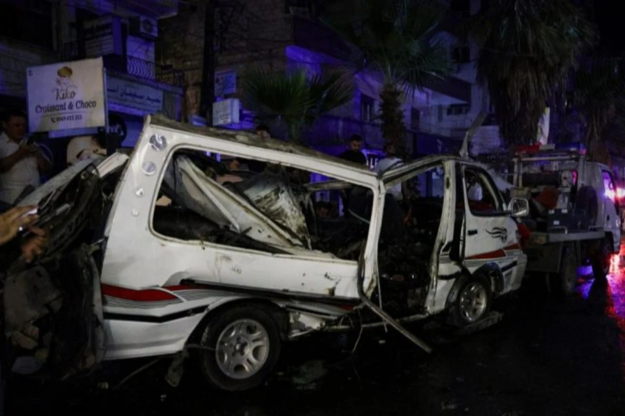 Explosion in Damascus suburb kills two, injures 13