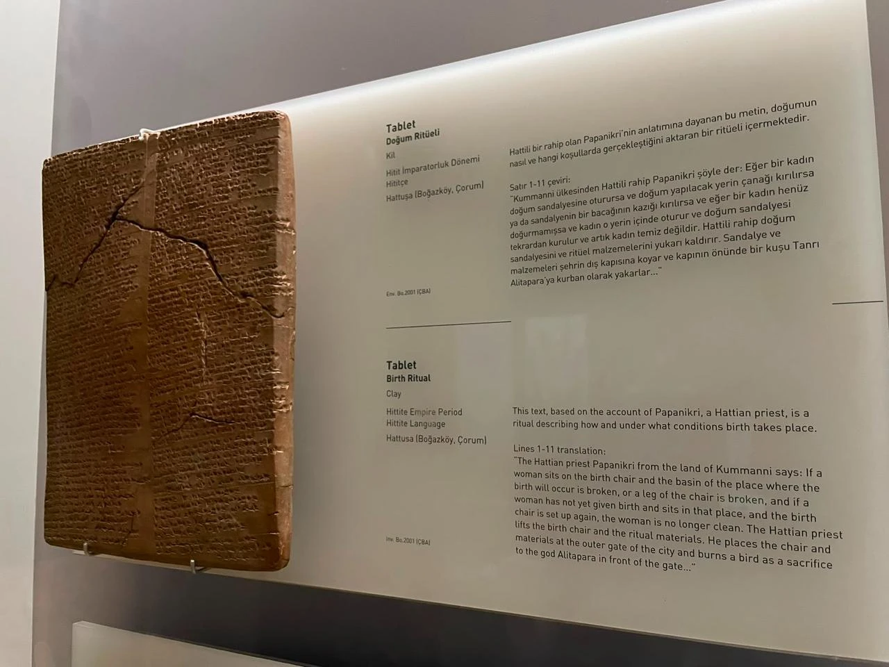 A Hittite clay tablet describing a birth ritual is displayed alongside its Turkish and English interpretation at the Museum of the Ancient Orient, Istanbul, Türkiye. (Photo by Koray Erdogan/Türkiye Today)