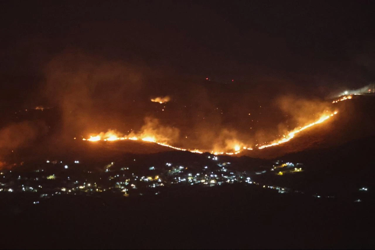 Forest fires sweep through the outskirts of the southern village of Kfar Shouba as a result of Israeli shelling that targeted the area, as seen from the southern Lebanese area of Marjayoun, Aug. 5, 2026. (AFP Photo)