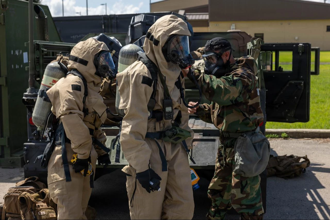 U.S. Marines prepare for a simulated casualty during chemical, biological, radiological, and nuclear training at Kunsan Air Base, North Jeolla province, South Korea, July 29, 2026. (Photo via U.S. Marine Corps)