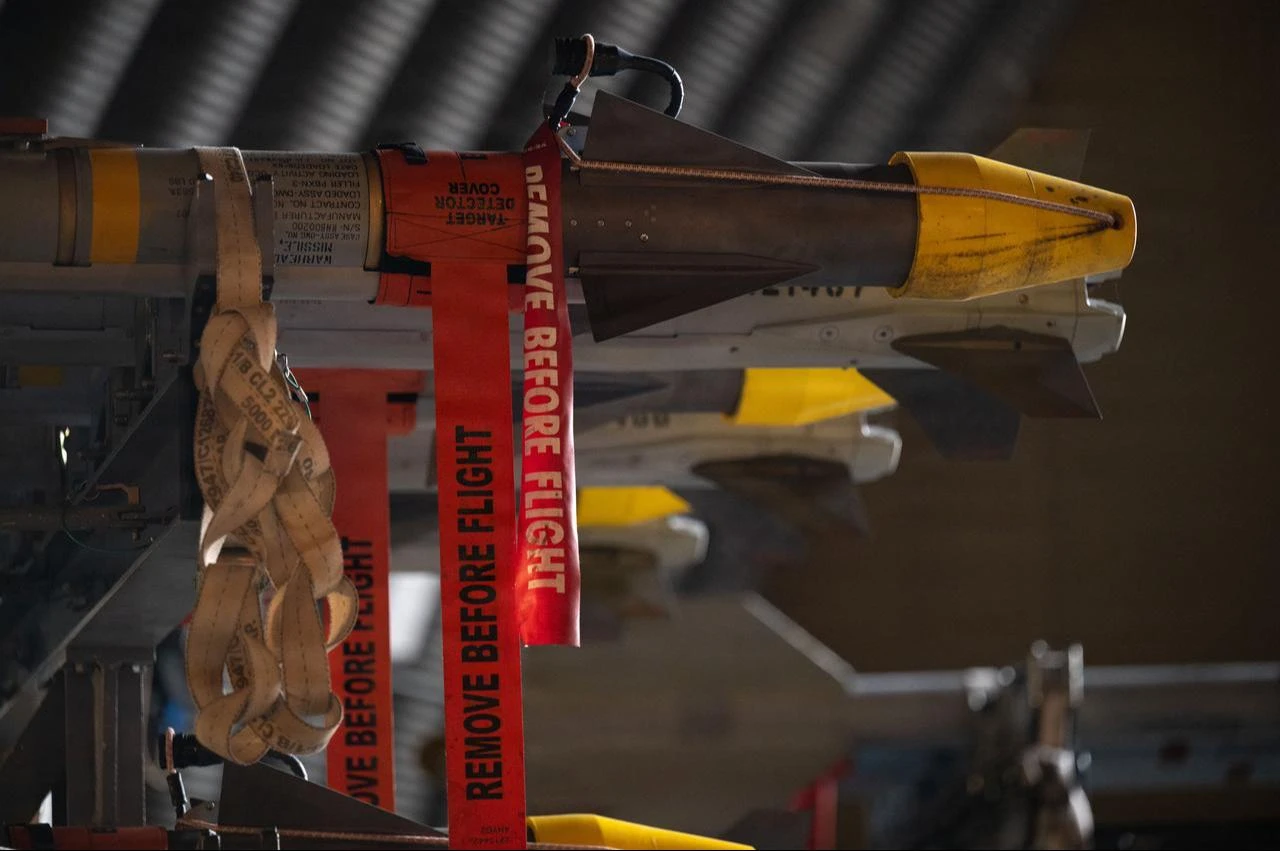 AIM-9 Sidewinder missiles sit on a trailer awaiting loading at RAF Lakenheath, England, July 22, 2026. (Photo via U.S. Air Force)
