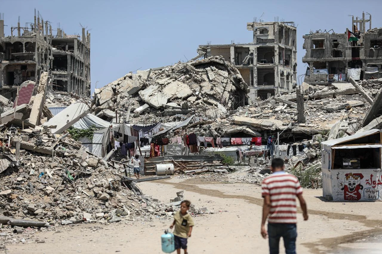 Displaced Palestinian families try to survive under challenging conditions amidst the rubble of destroyed buildings following Israeli attacks in Beit Lahia, northern Gaza Strip, Palestine on August 03, 2026. (AA Photo)
