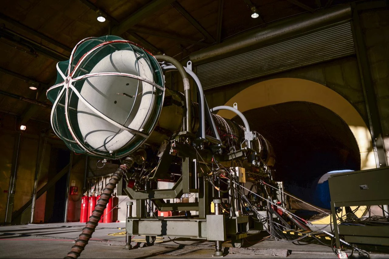 An F110-GE-100 jet engine sits on an engine test frame for inspection Nov. 6, 2014, at Eielson Air Force Base, Alaska. (Photo via U.S. Air Force)