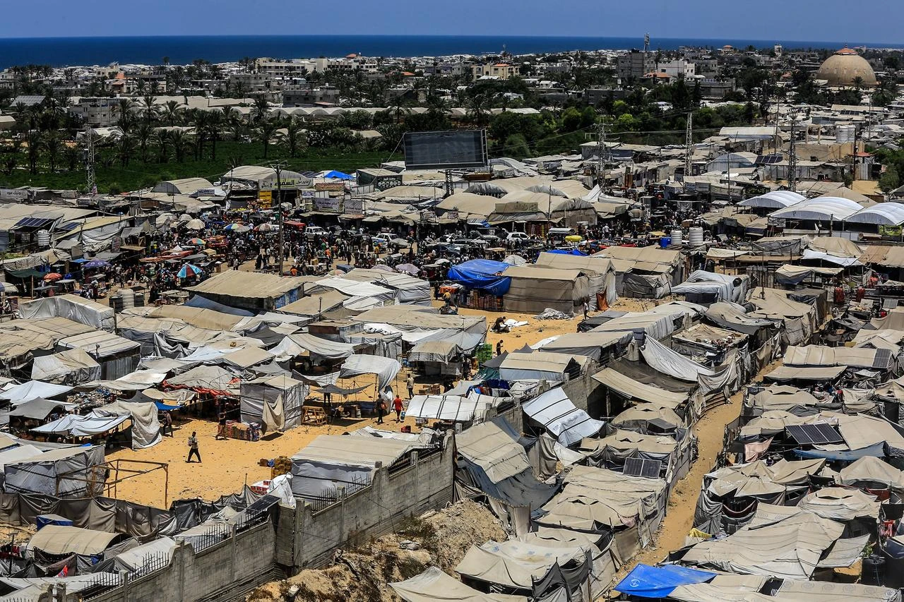 Displaced Palestinians continue to shelter at the Al-Aqsa University Al-Mawasi campus in Khan Yunis, southern Gaza, Palestine, after being forced to flee their homes due to Israeli attacks, Aug. 5, 2026. (AA Photo)