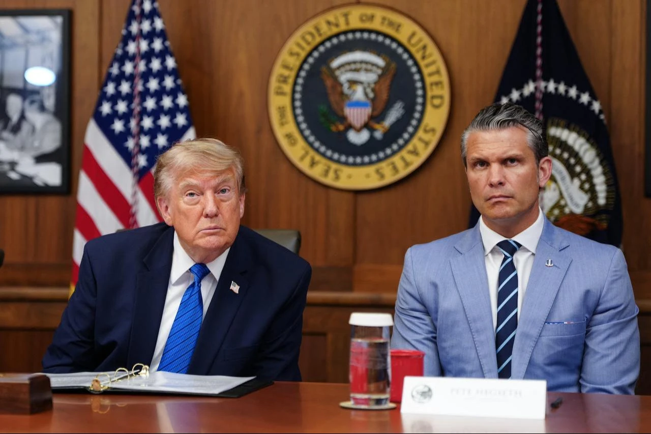 US President Donald Trump and US Secretary of Defense Pete Hegseth listen to questions from the press during a Cabinet meeting at Camp David in Maryland, July 31, 2026. (AFP Photo)