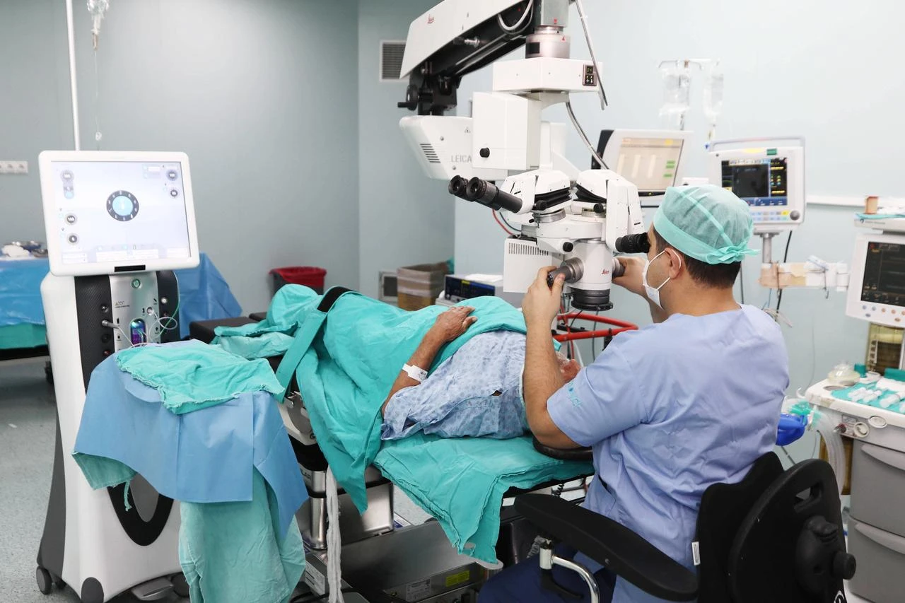 Eye doctor with patient in Gaziantep University (GAUN) Sahinbey Research and Application Hospital. (AA Photo)