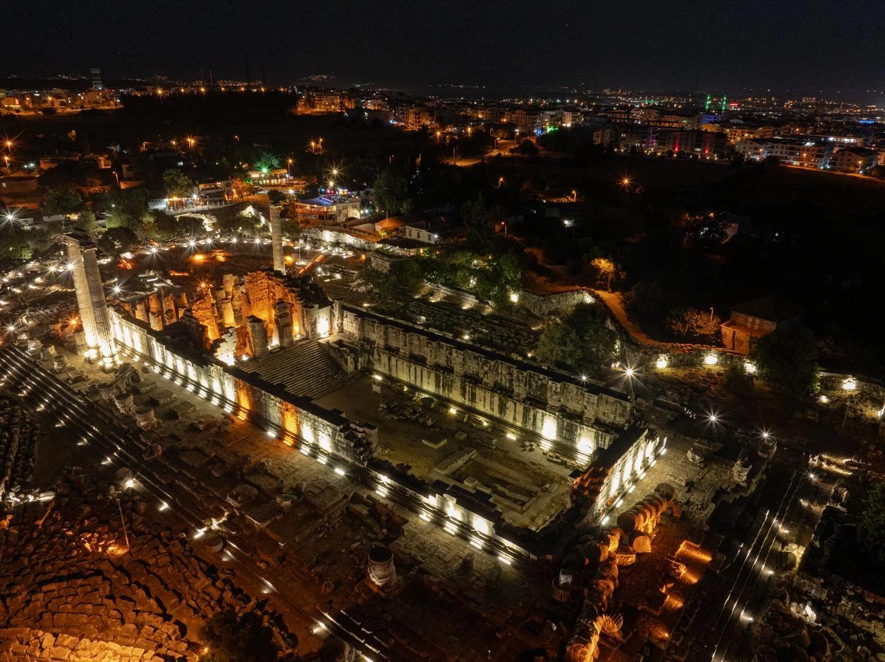 An aerial view of the ancient Temple of Apollo in the Didim district of Aydin, Türkiye, illuminated as part of the Night Museums program on June 25, 2026. (AA Photo)