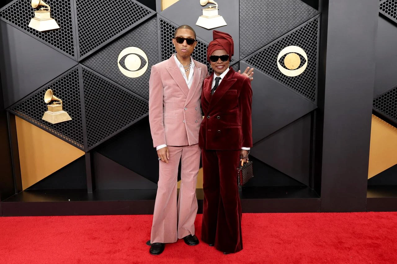 Pharrell Williams and Angelique Kidjo pose on the red carpet at the 68th Grammy Awards at Crypto.com Arena in Los Angeles, Feb. 1, 2026. (AFP Photo)