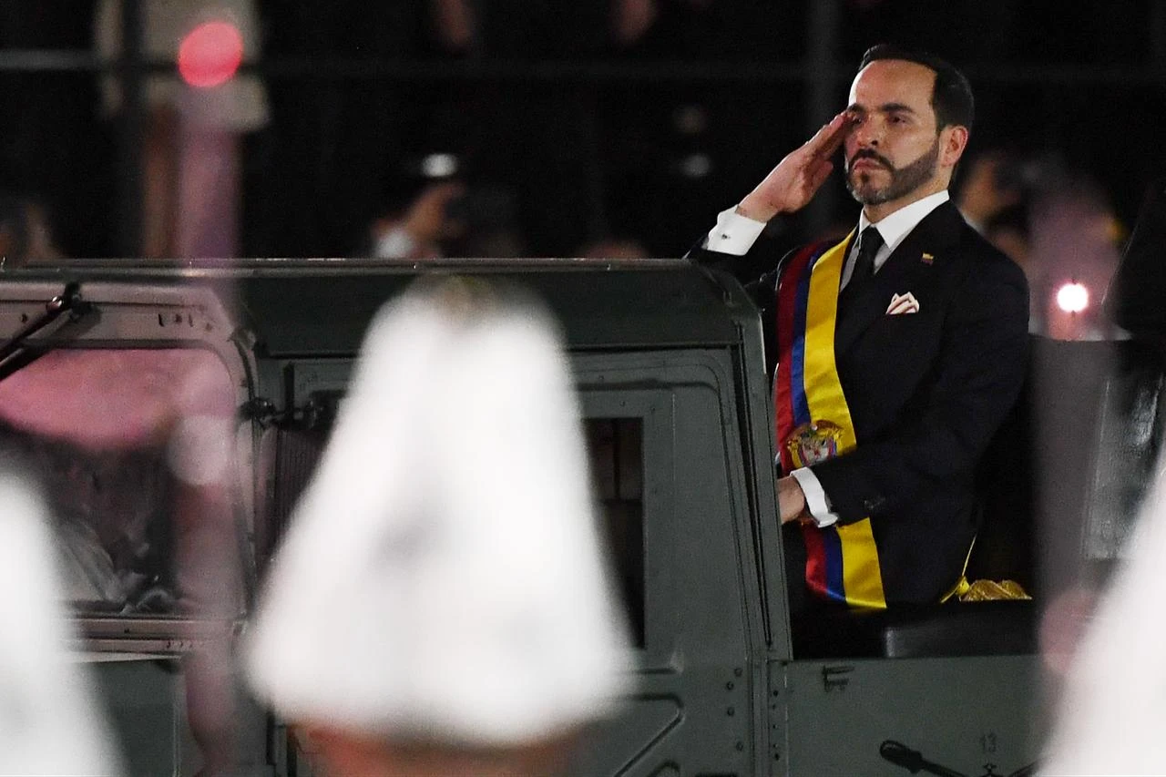 Colombia's new President Abelardo de la Espriella rides in a military vehicle while reviewing troops during a change-of-command ceremony at the Pichincha Battalion following his inauguration in Cali, Colombia, August 7, 2026. (AFP Photo)