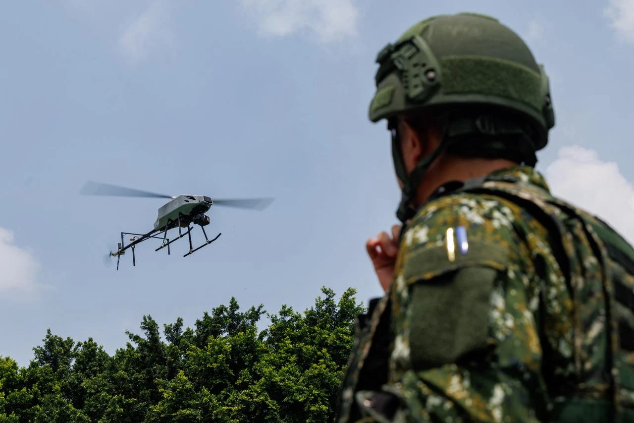 A Taiwanese military Tactical-2 unmanned aerial vehicle (UAV) flies during a combat-readiness training in Chang-Hua County, August 6, 2026. (AFP Photo)