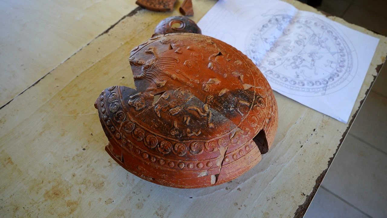 A close-up shows the sixth-century liturgical vessel featuring figures associated with Prophet Daniel's vision, uncovered at Antioch of Pisidia in Türkiye. (AA Photo)