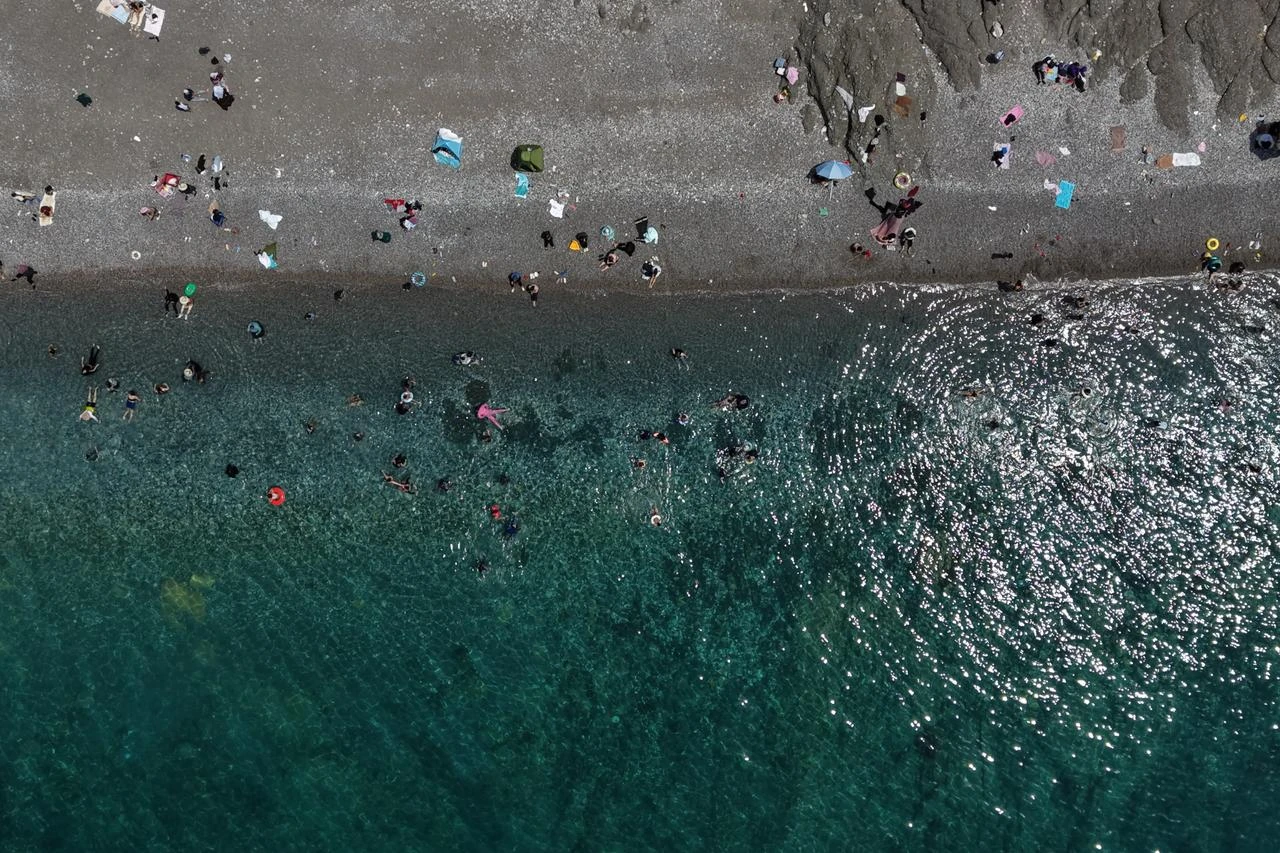 Van's only blue-flag beach draws crowds in summer heat