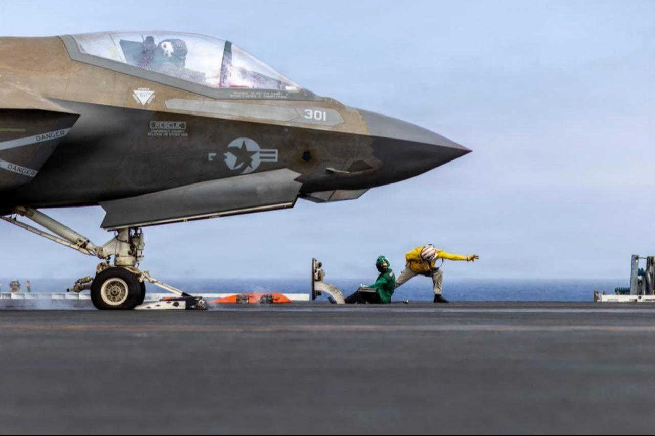 A U.S. Navy F-35C Lightning II fighter jet prepares for launch from the flight deck of an aircraft carrier during operations in the Middle East. (Photo via X/@CENTCOM)