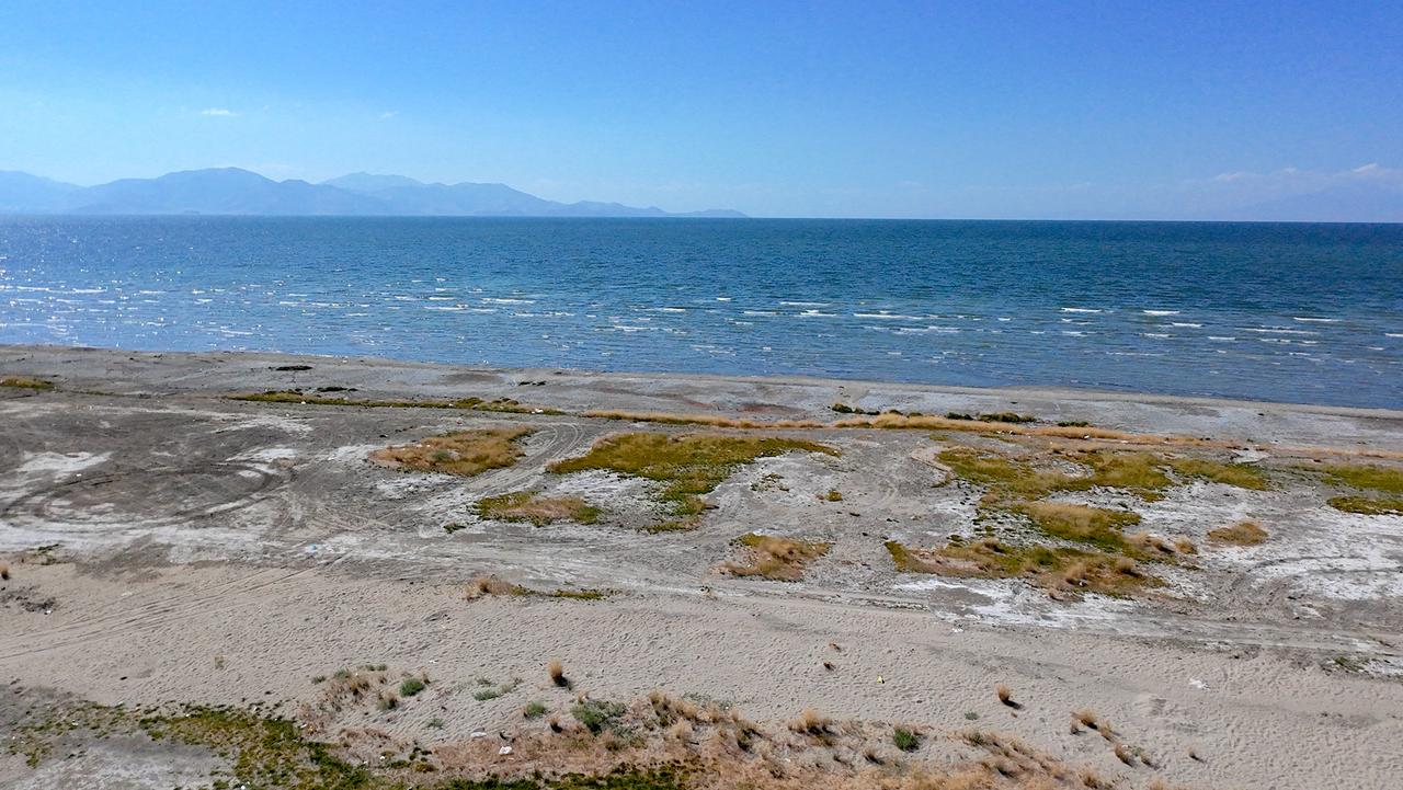 Exposed sections of Lake Van’s shoreline are seen as drought conditions continue despite periods of heavy rainfall in Van, Türkiye, Sept. 1, 2026. (AA Photo)