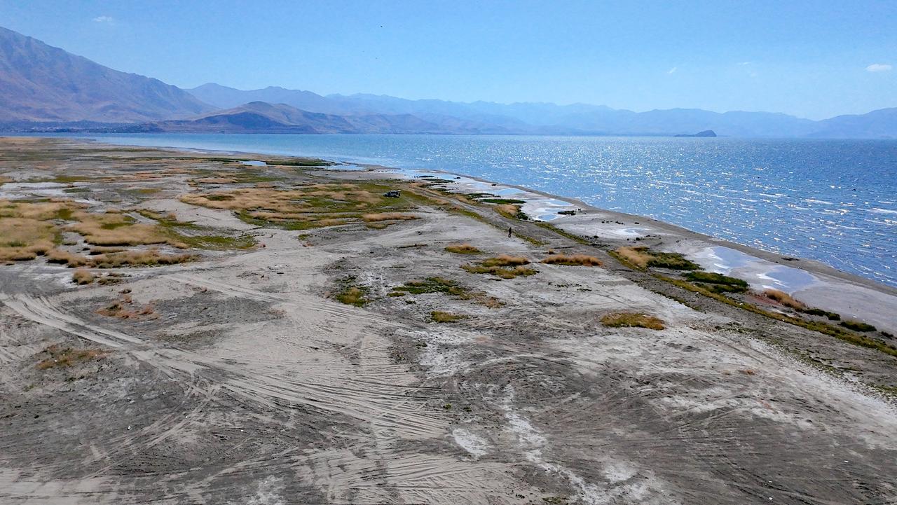 An aerial view shows the receded shoreline of Lake Van amid continued drought pressure in Van, Türkiye, Sept. 1, 2026. (AA Photo)