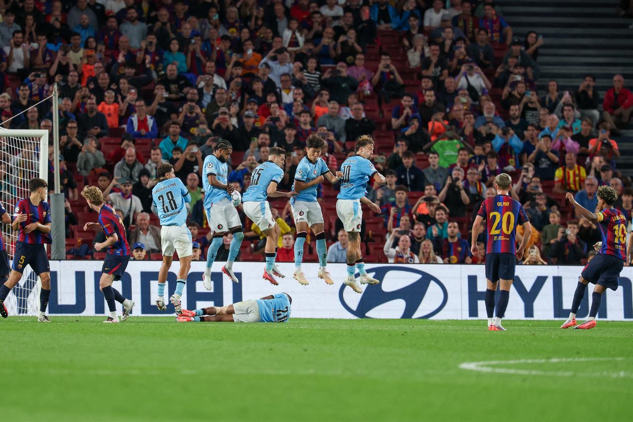 Barcelona's Spanish forward #10 Lamine Yamal (R) scores his team's fourth goal during the UEFA Champions League first round day 1 football match between FC Barcelona and Feyenoord at Camp Nou stadium in Barcelona on September 9, 2026. (AFP Photo)