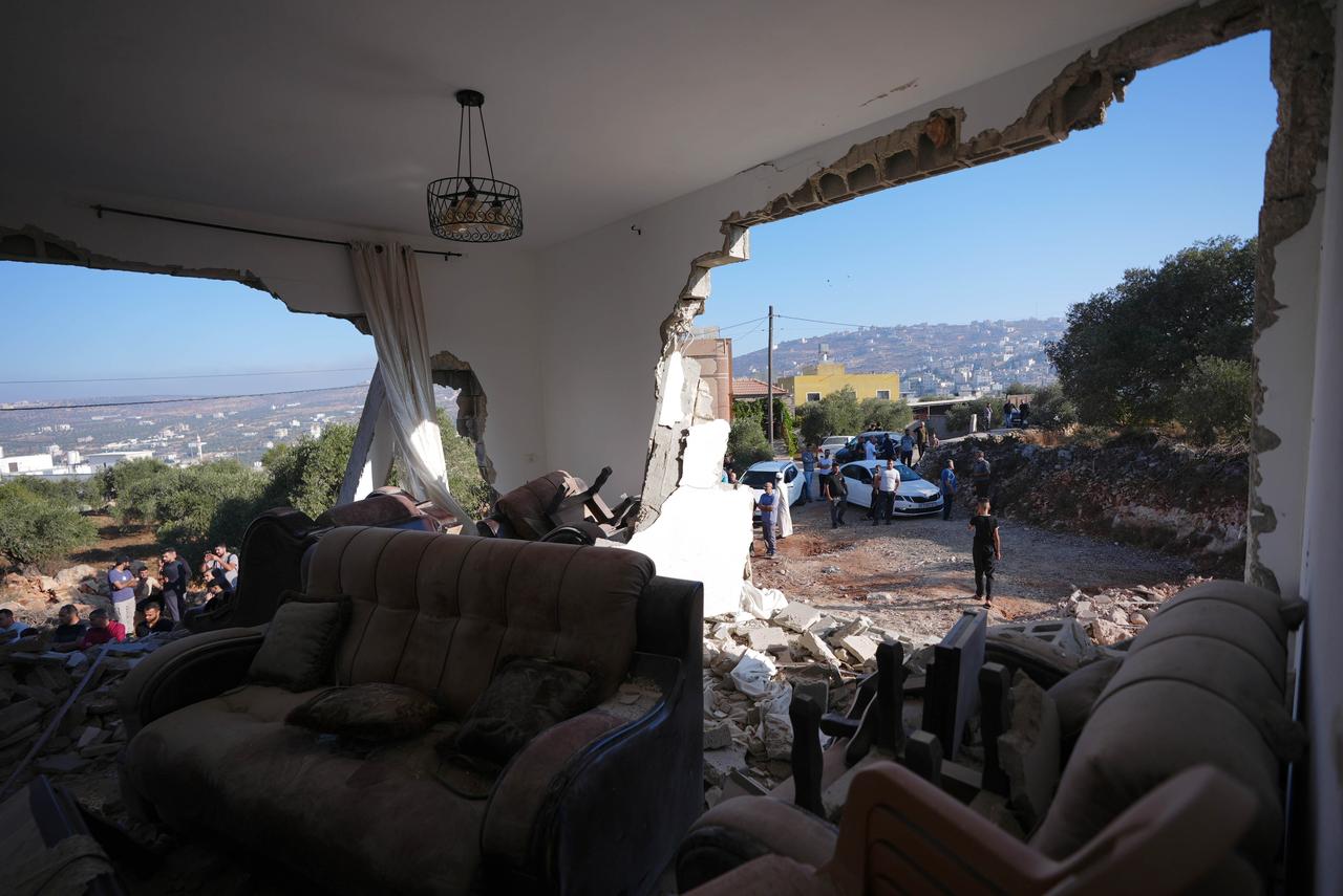 Local Palestinians inspect severe damage inside a family home following an Israeli military raid and siege in the Diriya area, south of Nablus in West Bank, Palestine on September 8, 2026. (AA Photo)
