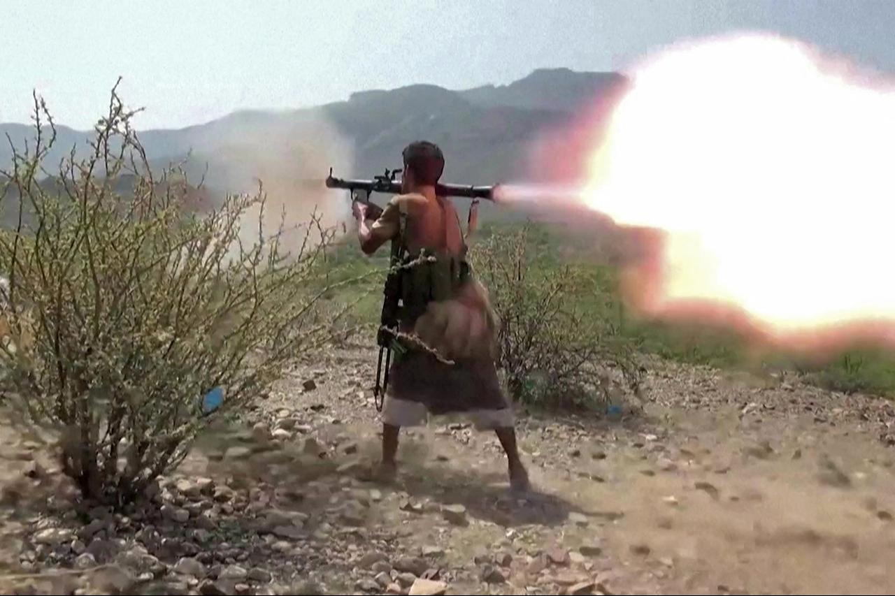 This screen grab, taken from video footage, shows a Saudi-backed National Resistance Forces member in Yemen firing a rocket-propelled grenade (RPG). (AFP Photo/Yemen National Resistance Forces/Handout)