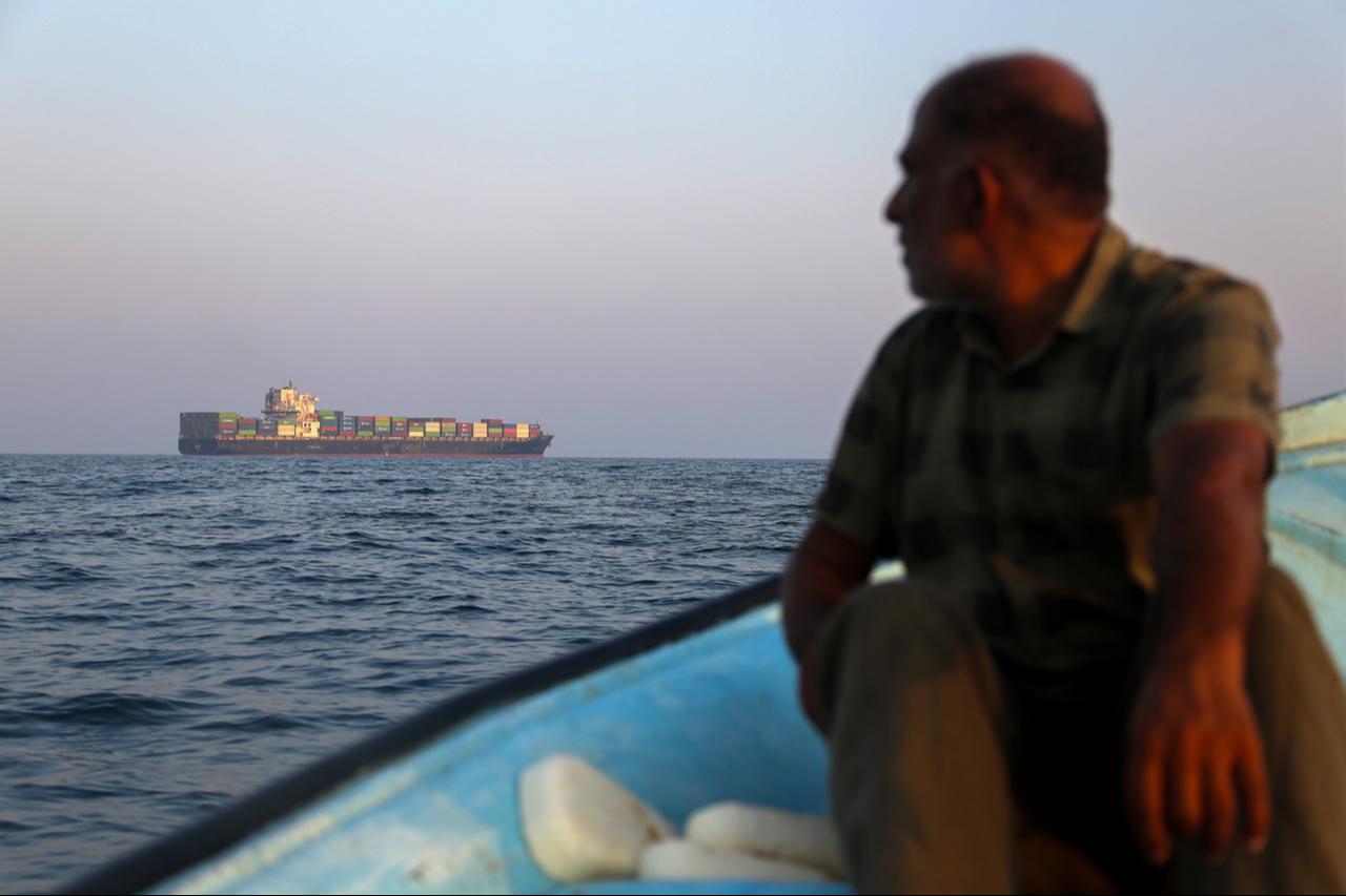 Commercial vessels are seen anchored between Iran’s Qeshm and Larak islands amid disruptions to maritime traffic in the Strait of Hormuz, Iran on September 11, 2026. (AA Photo)