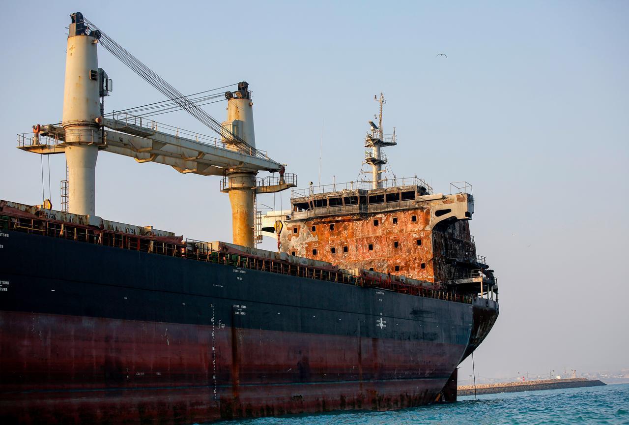 The Thailand-flagged bulk carrier "Mayuree Naree," which was struck by a missile near the Strait of Hormuz, is seen stranded off the coast of Qeshm Island, Iran, Sept. 11, 2026. (AA Photo)