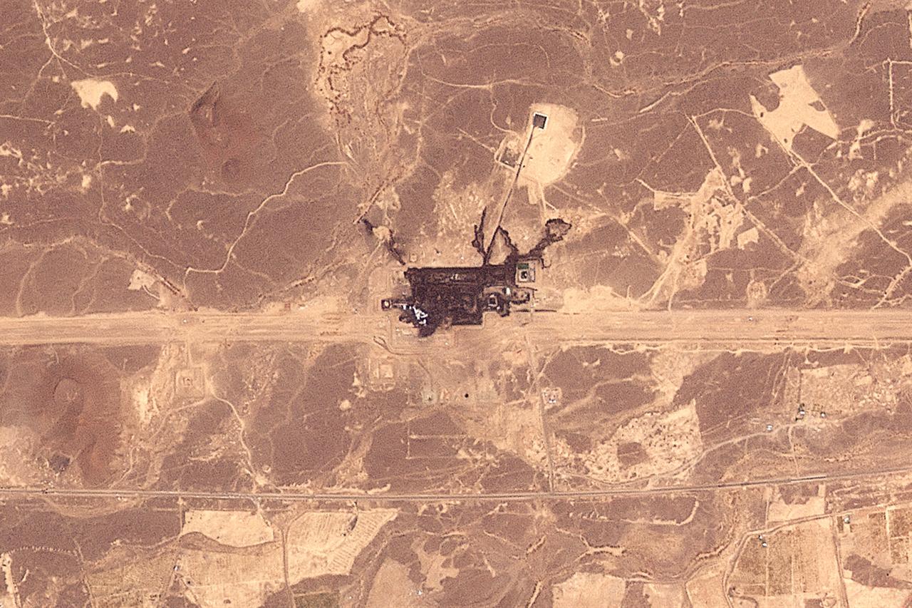 This handout satellite image taken by Planet Labs PBC on September 11, 2026 shows a general view of an infrastructure site after it was damaged by fire southeast of Medina along the general route of Saudi Arabia's East-West pipeline (Petroline). (AFP Photo/Handout/Planet Labs)