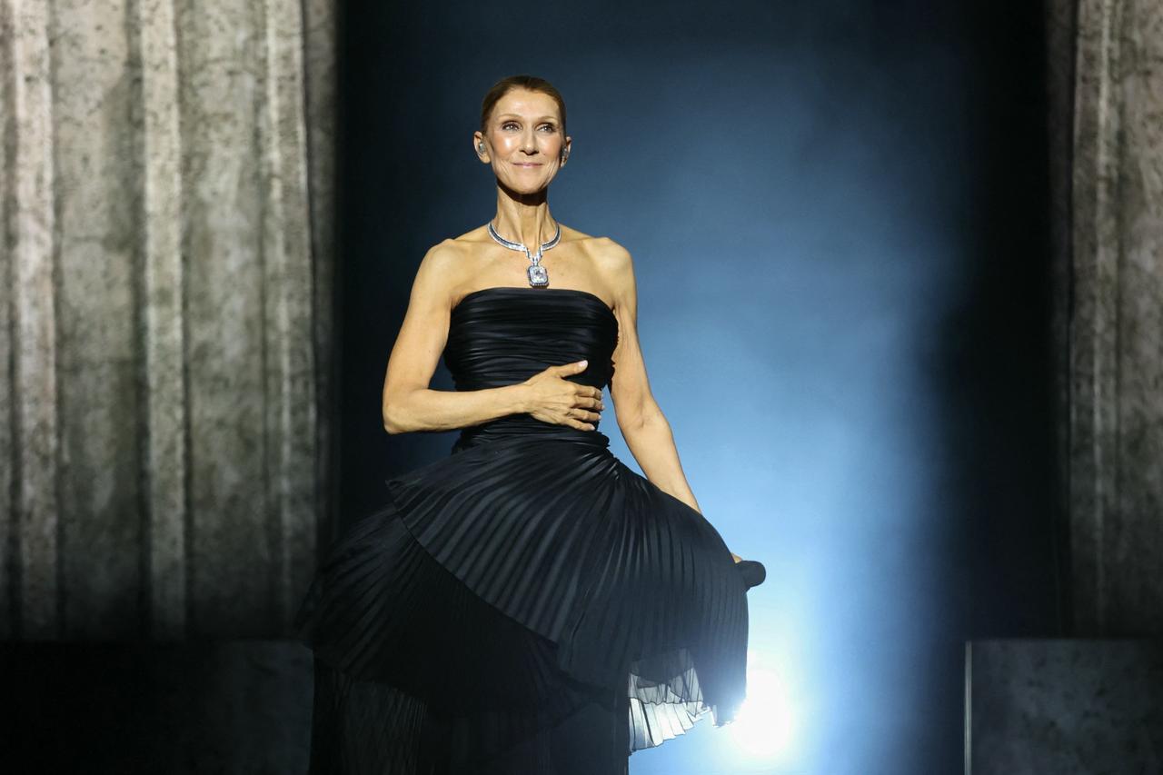 Dion makes emotional comeback to stage