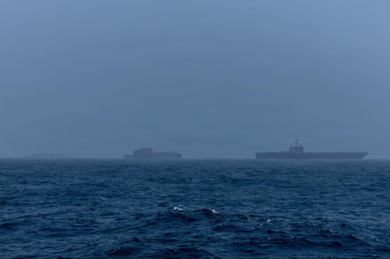 USS Abraham Lincoln (CVN 72), USNS Arctic (T-AOE 8), and Lewis and Clark-class dry cargo ship USNS Alan Shepard (T-AKE-3) sail in the Arabian Sea, Aug. 16, 2026. (Photo via U.S. Navy)