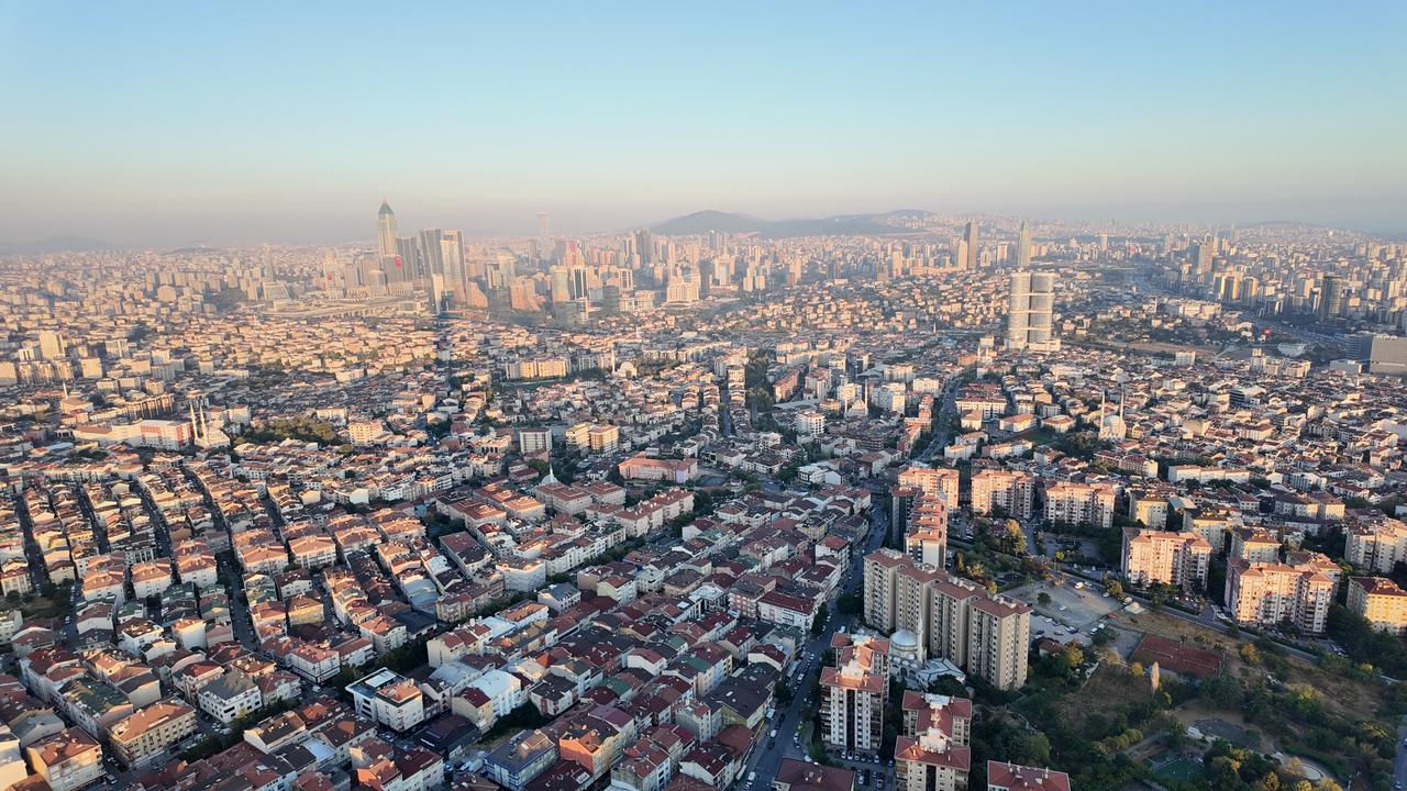 An aerial view shows Istanbul's dense urban landscape and business district in Istanbul, Türkiye. (Adobe Stock Photo)