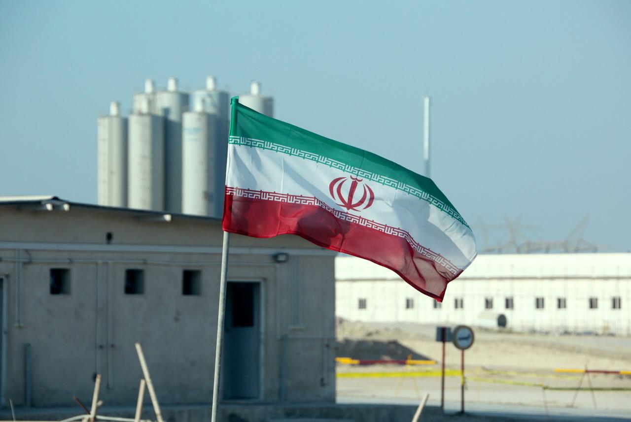 A picture taken on November 10, 2019, shows an Iranian flag in Iran's Bushehr nuclear power plant, during an official ceremony to kick-start works on a second reactor at the facility. (AFP Photo)