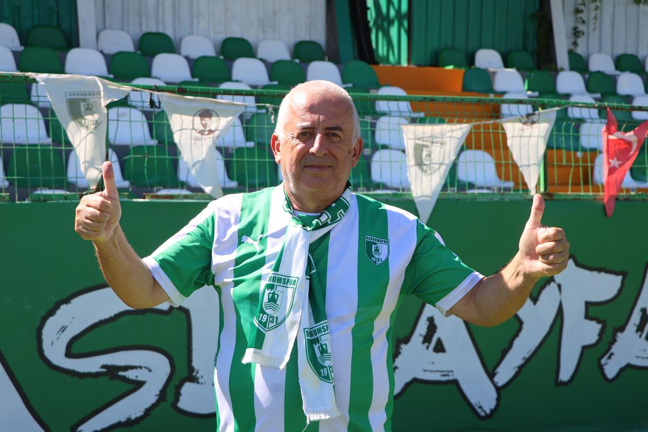 Bodrum FK supporter Birol Ahi poses at Bodrum Stadium after receiving a lifetime season ticket from the club, in Bodrum, Mugla, Türkiye, Sept. 13, 2026. (AA Photo)