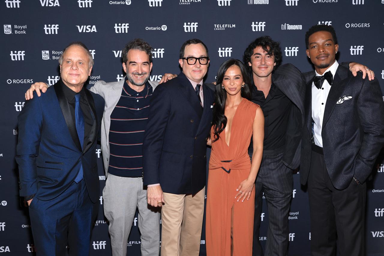 Members of the "I Play Rocky" cast and production team pose at the film's world premiere during the 2026 Toronto International Film Festival in Toronto, Canada, Sept. 12, 2026. (AFP Photo)