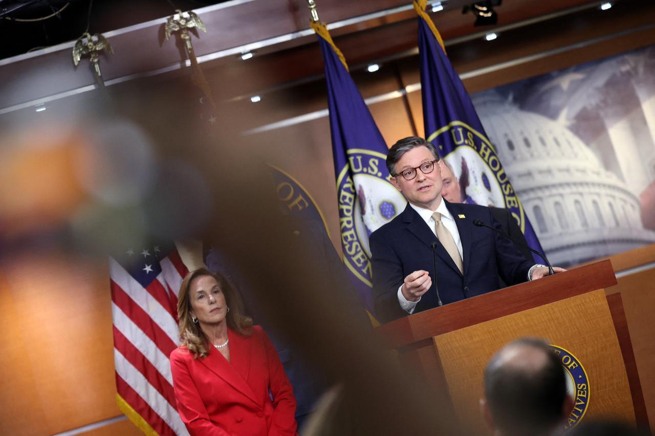 U.S. Speaker of the House Mike Johnson (R-LA), joined by Conference Chair Rep. Lisa McClain (R-MI), speaks at a press conference at the U.S. Capitol on April 21, 2026 in Washington, DC. (AFP Photo)