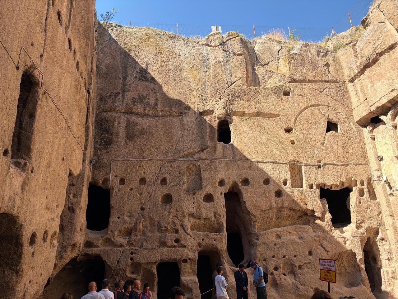 Inside view of the rock-carved courtyard at Gumusler Monastery in Nigde. (Photo via Türkiye Today Staff)