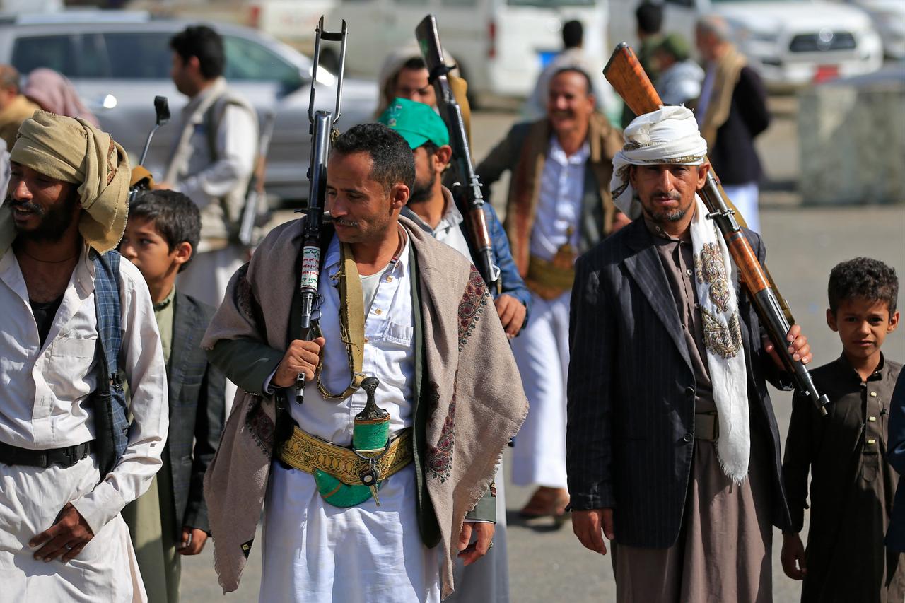 Fighters loyal to the Houthi authorities march during a rally to recruit more fighters in Sanaa on September 10, 2026. (AFP Photo)