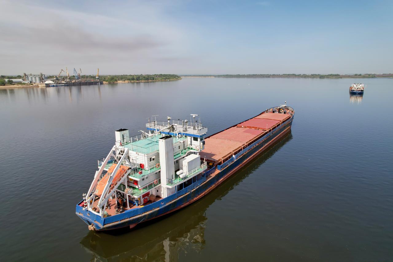 A cargo ship sails along the Volga River near a grain port in Volgograd, Russia. (Adobe Stock Photo)
