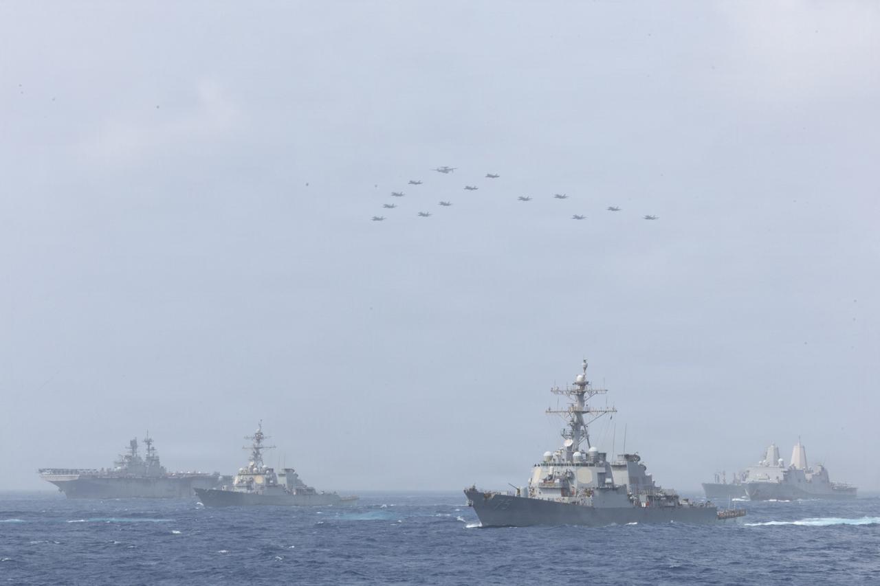 U.S. Navy warships and aircraft transit the Arabian Sea in close formation as CENTCOM forces continue to promote regional security and stability, June 30, 2026. (Photo via U.S. Navy)