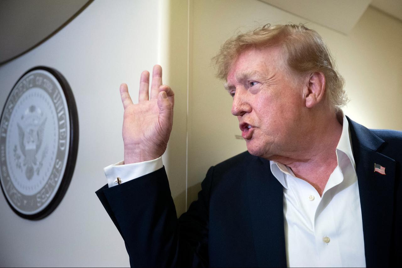US President Donald Trump speaks to the press aboard Air Force One while flying to Joint Base Andrews, Maryland from Ireland on September 13, 2026. (AFP Photo)