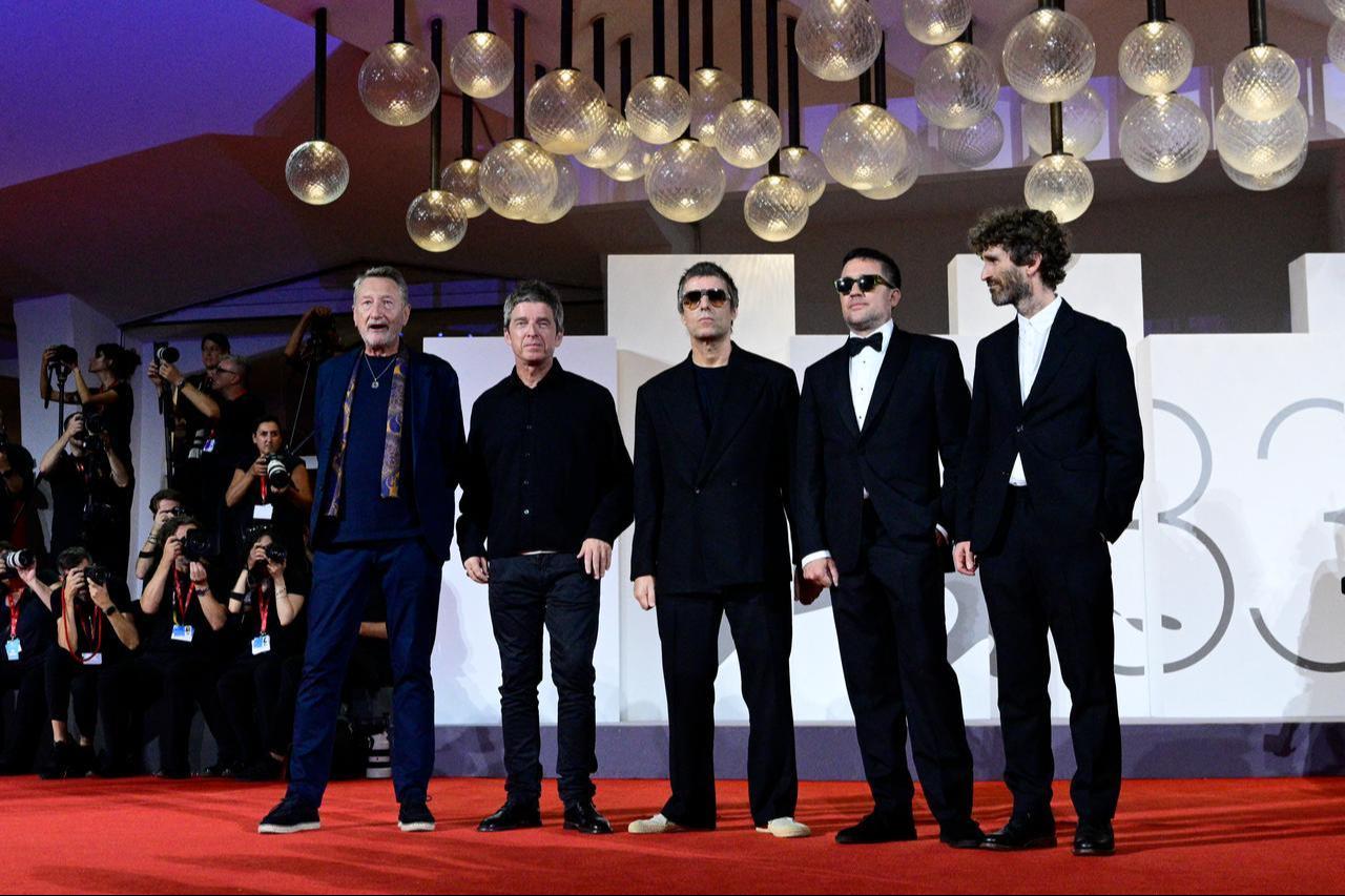 From left : Steven Knight, British brothers Noel Gallagher and Liam Gallagher, Dylan Southern and Will Lovelace attend the red carpet event for the screening of "Oasis: don't look back in anger" at Venice Lido on Sept. 5, 2026. (AFP Photo)